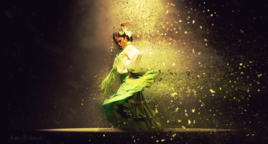 An stage lit by a single spotlight on a dark background